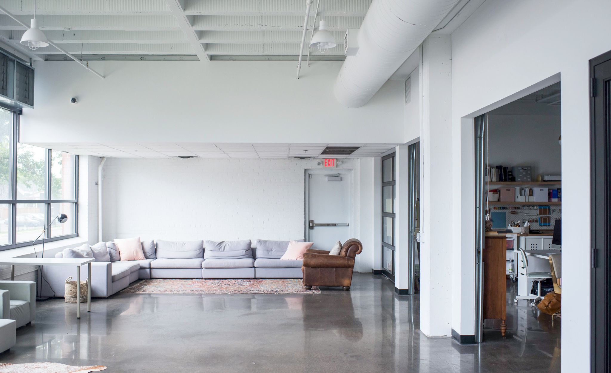 Furniture can be moved and rearranged in the open space to suit various functions from client photo shoots to community events.