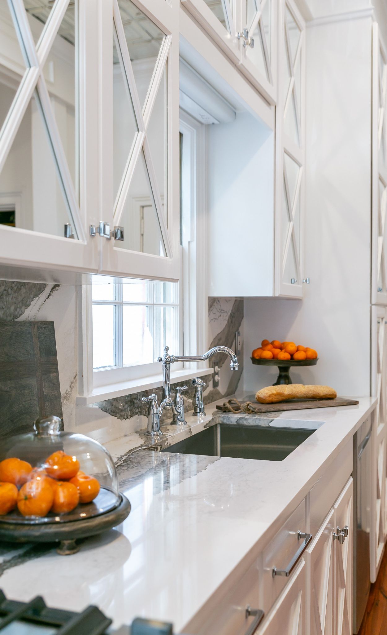 Cambria Skara Brae paired with white cabinets.