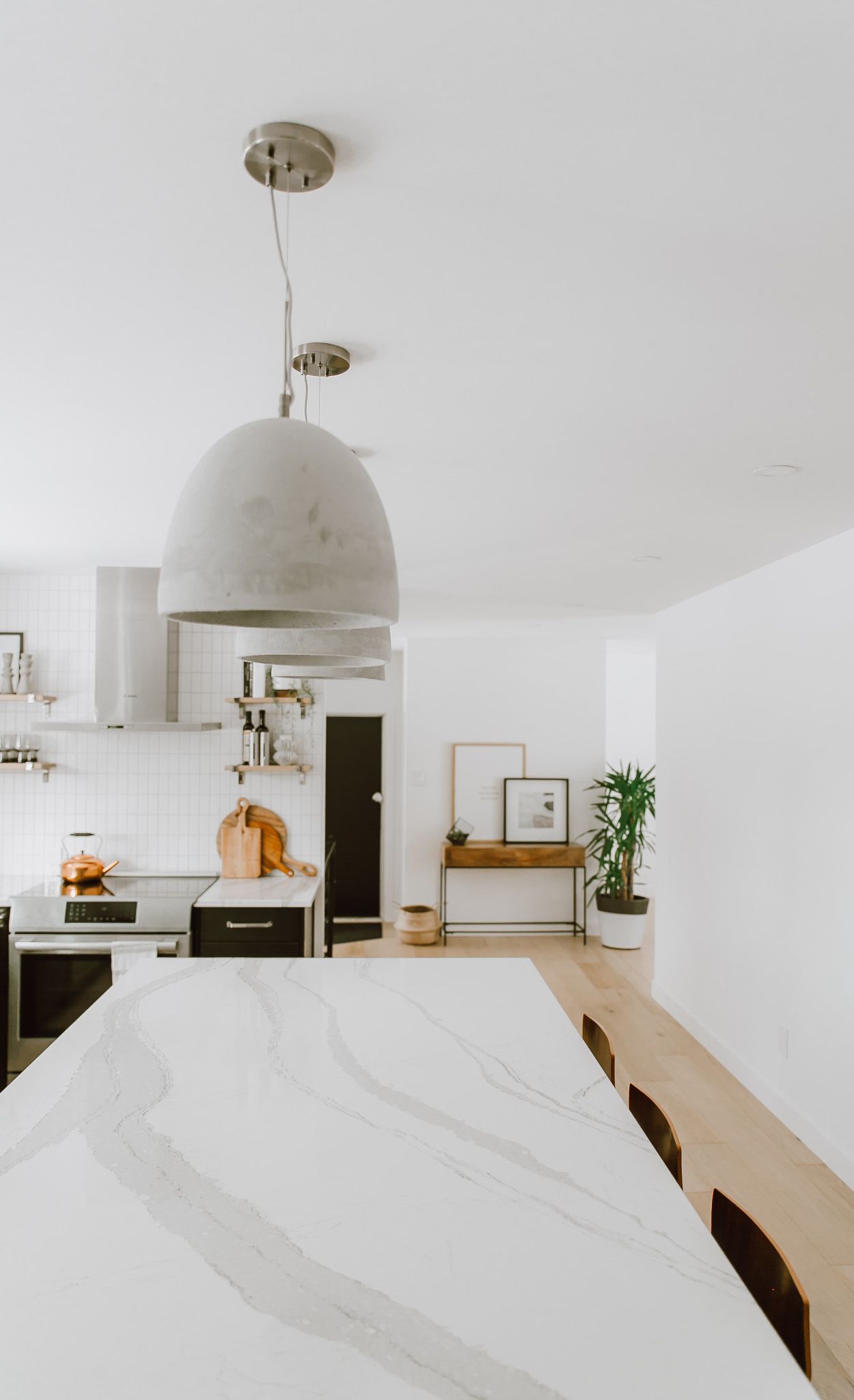 Cambria Brittanicca island in high contrast kitchen.