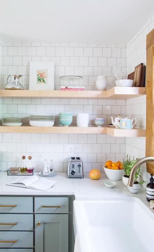 Light earth tones paired with Cambria Ella countertops.