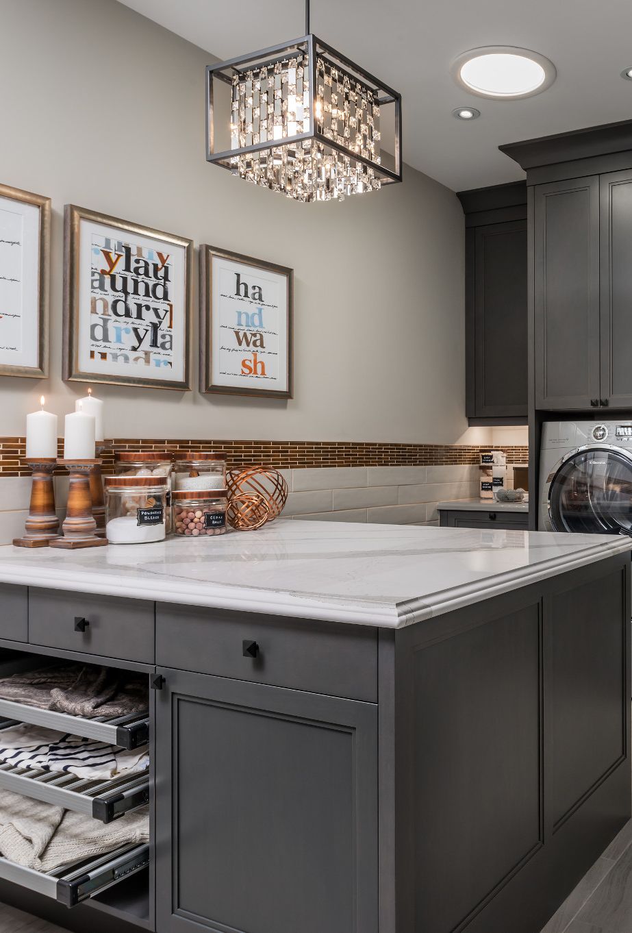 Cambria Brittanicca countertops in a neutral toned laundry room.