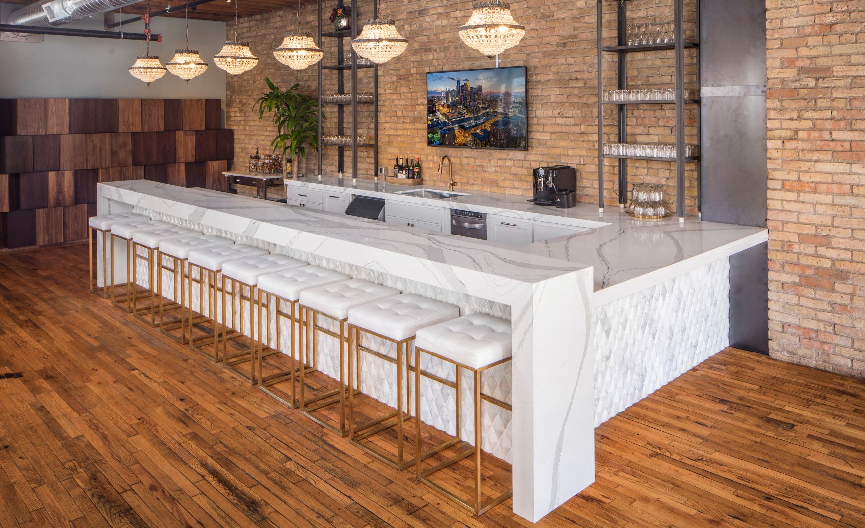 Cambria Brittanicca makes a durable waterfall-edge bar at this event center.