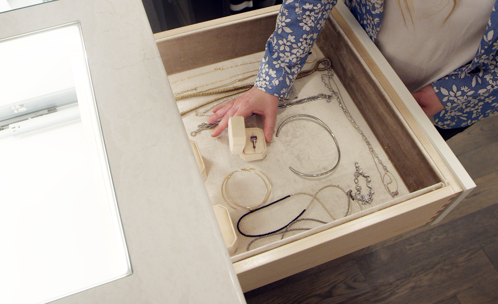 Carly Zucker shows a detailed view of an organized jewelry drawer.