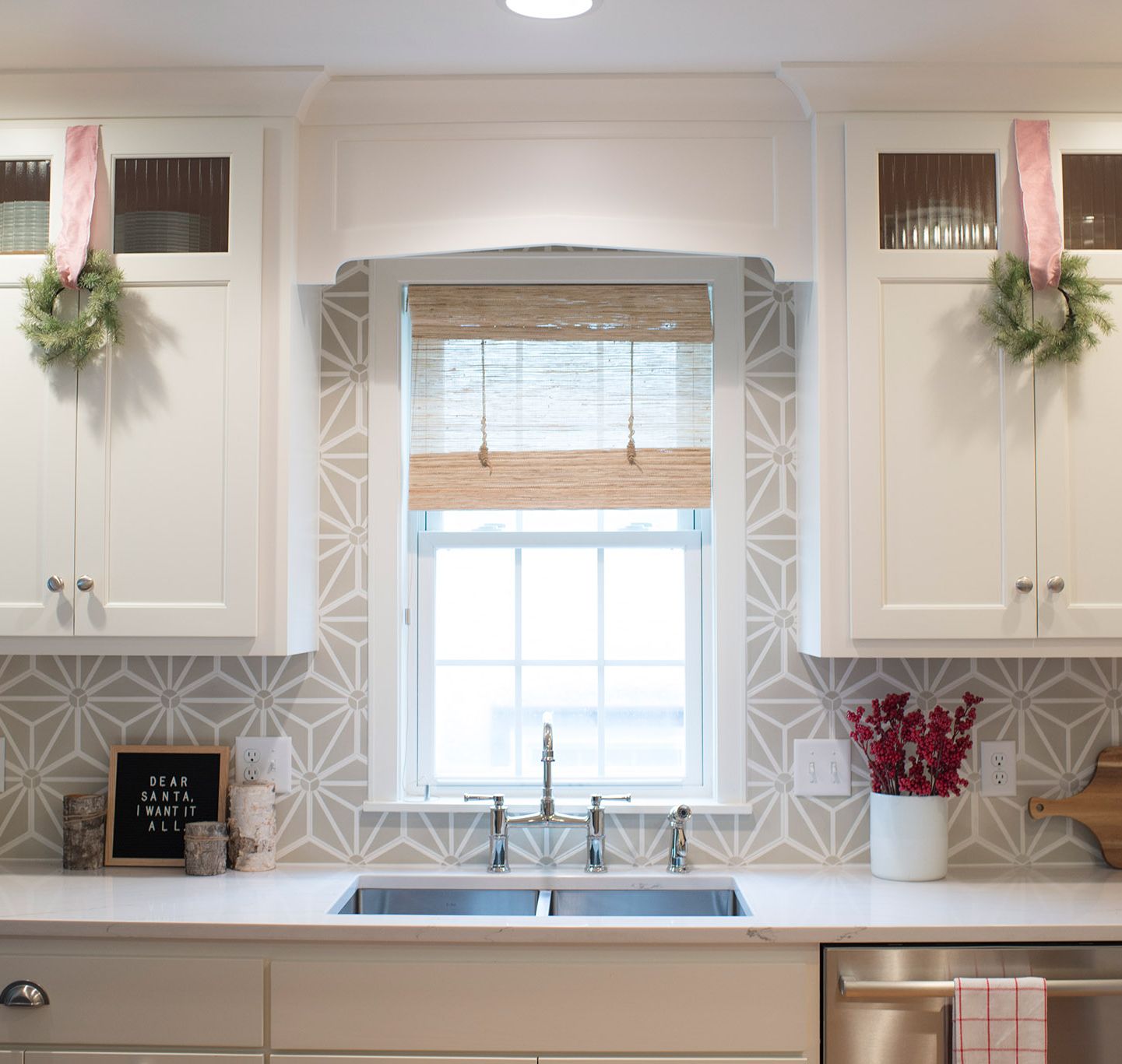 A red and white palette creates Christmas simplicity in this kitchen featuring Ella