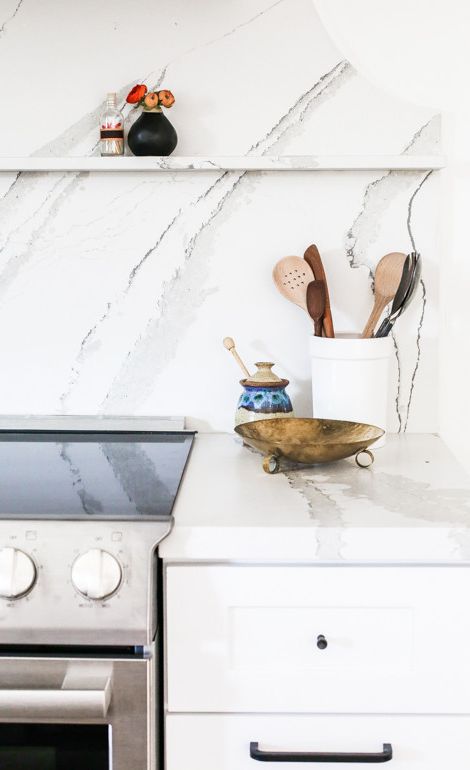 Custom integrated Cambria Brittanicca Matte shelf.