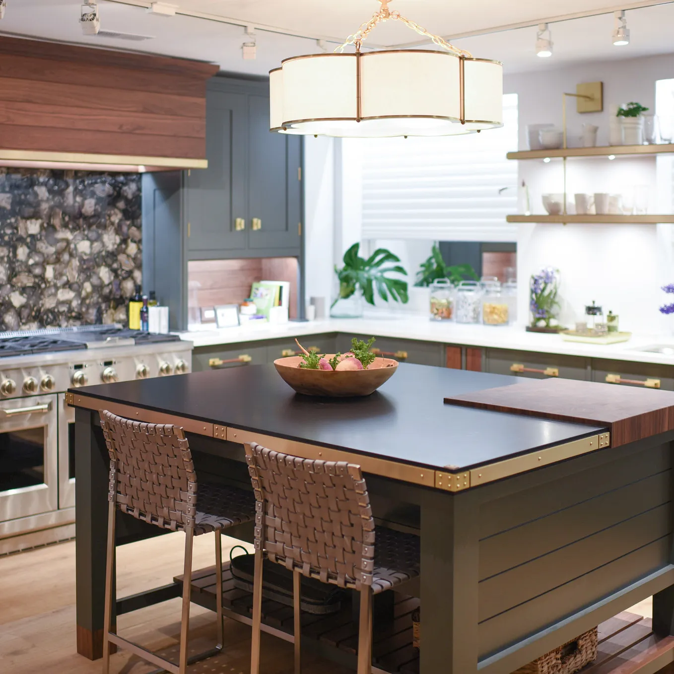 A black and wood kitchen with Cambria Blackpool Matte countertops featured in the Kips Bay Decorator Show House.
