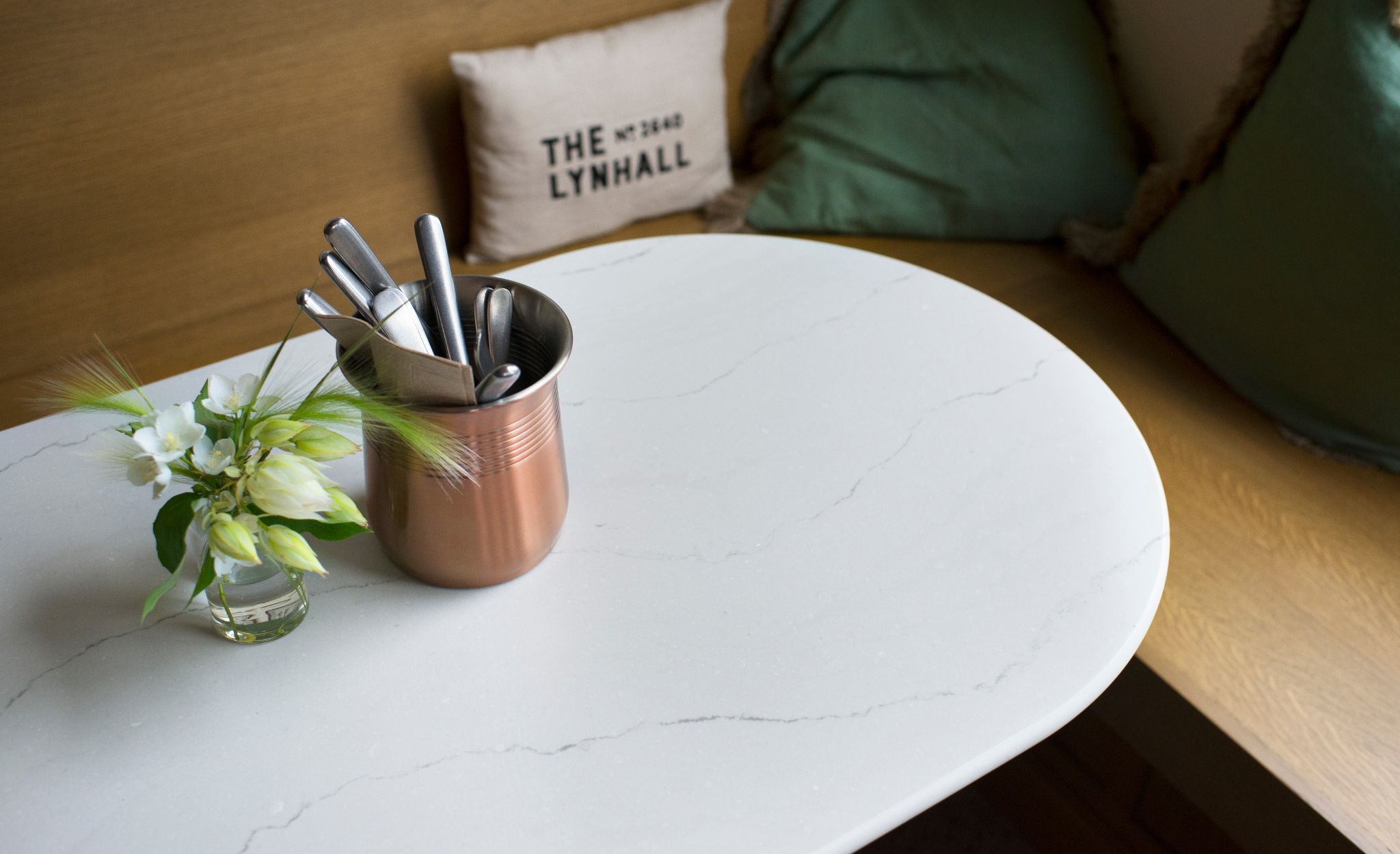Cambria Ella Matte countertops and paneling offer a durable and easy to clean marble alternative.