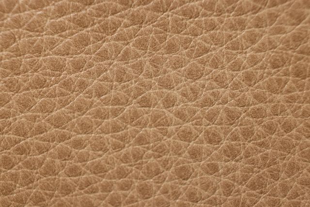 Jasper Light Brown Leather Large Dual Power Reclining Two-arm Sectional
