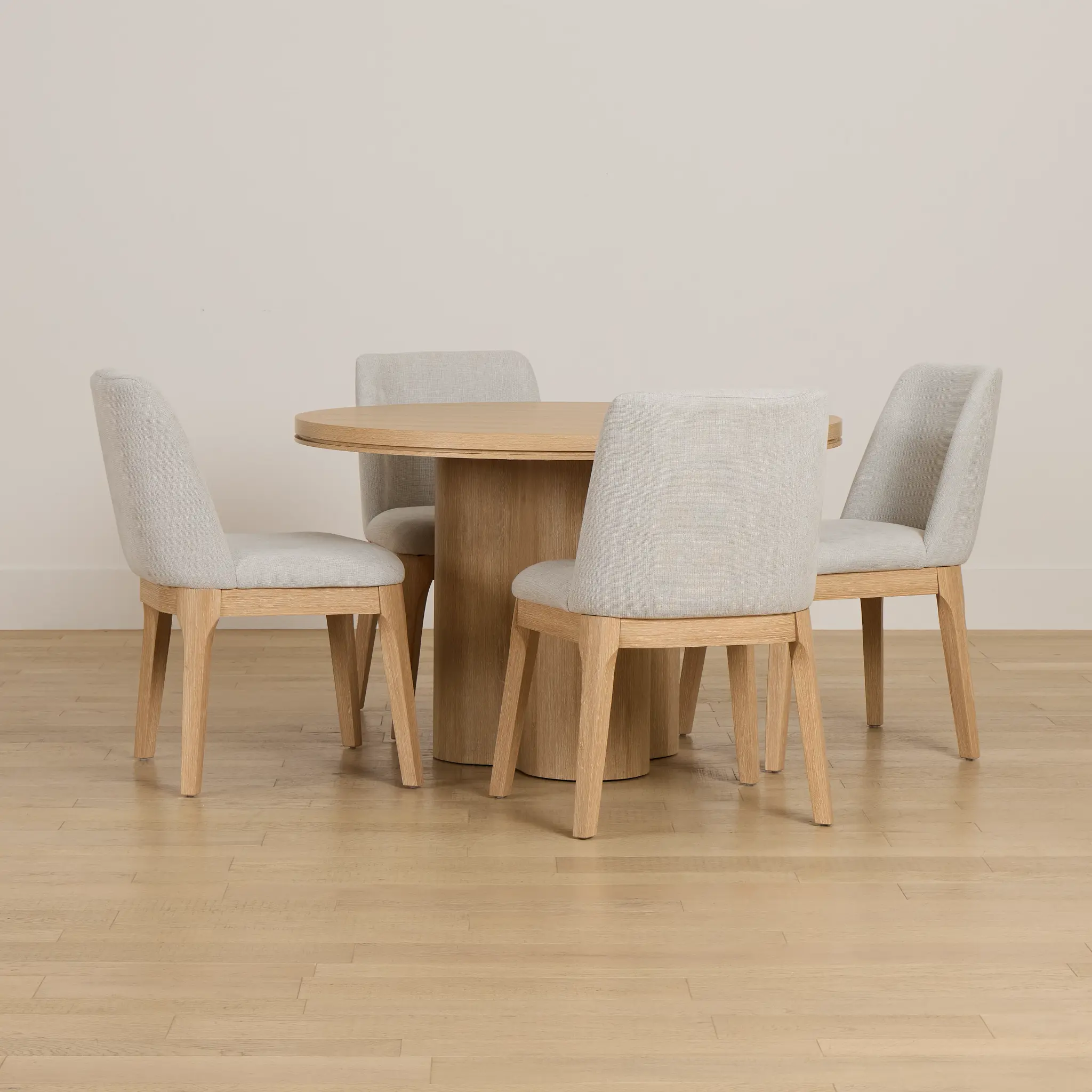 Emory Light Tone Round Table & 4 Upholstered Chairs Emory Light Tone Round Table & 4 Upholstered Chairs