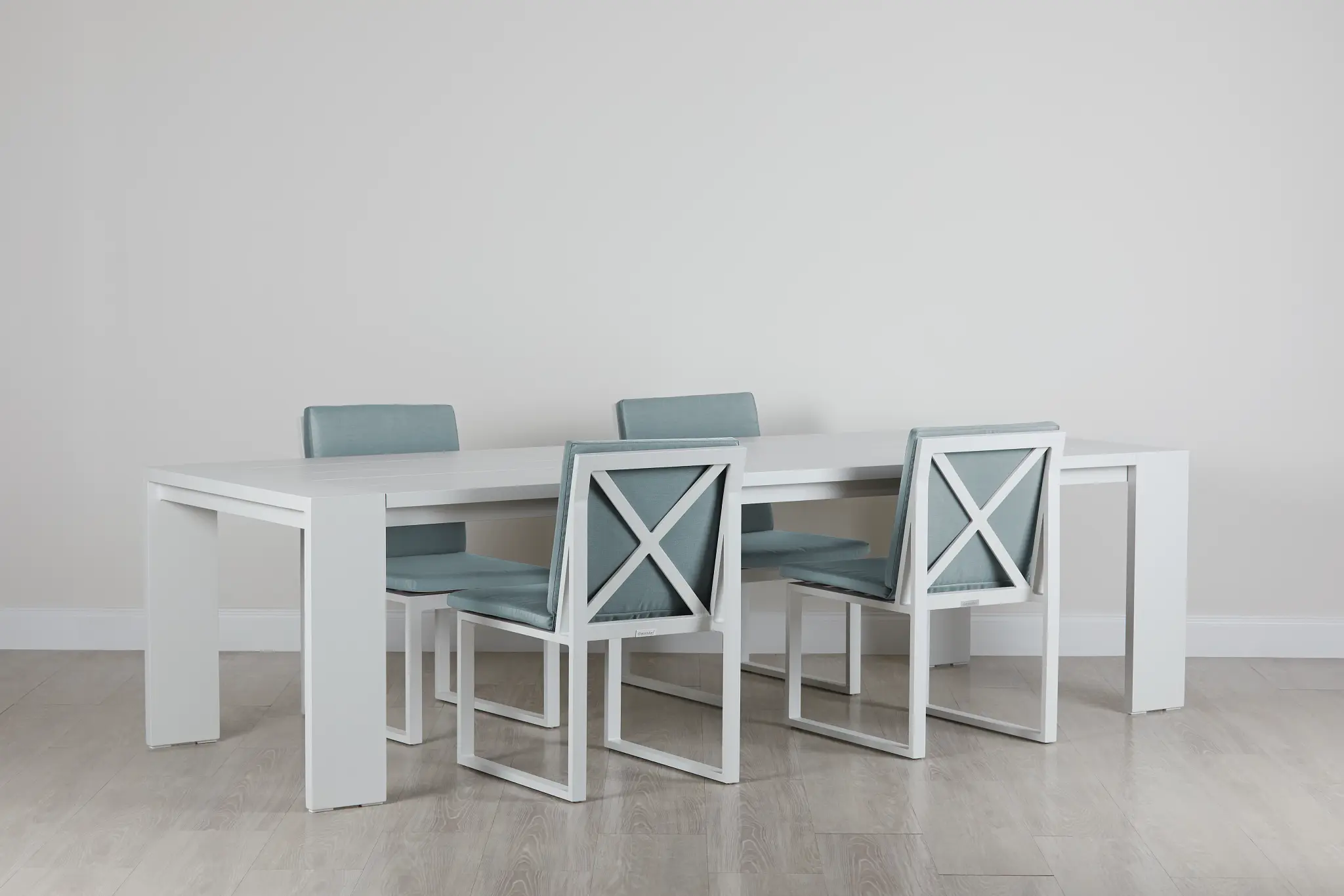 Linear White Teal 110" Aluminum Table & 4 Cushioned Side Chairs Linear White Teal 110" Aluminum Table & 4 Cushioned Side Chairs