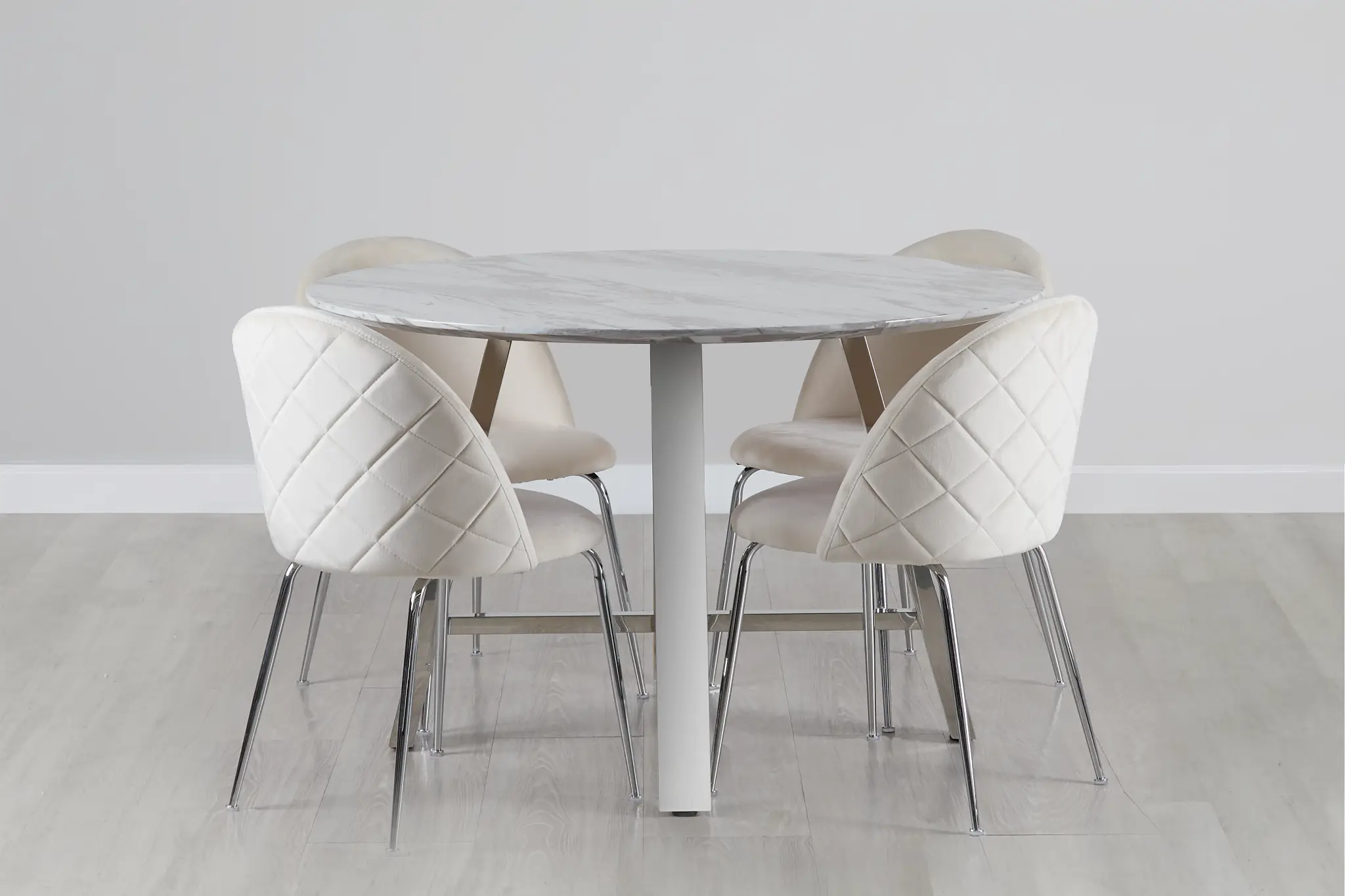 Capri Stainless Steel Ivory Round Table & 4 Upholstered Chairs Capri Stainless Steel Ivory Round Table & 4 Upholstered Chairs