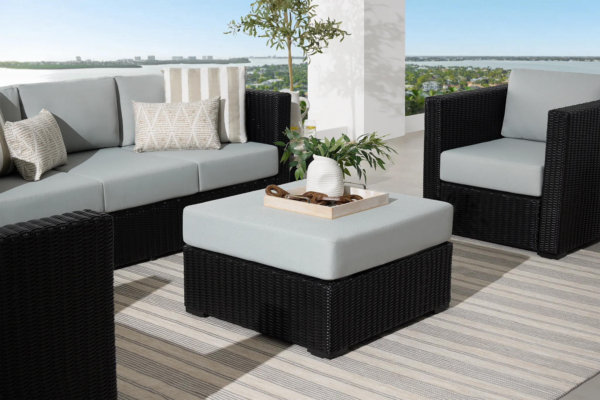 Montecito Black Large Ottoman With Light Blue Cushions