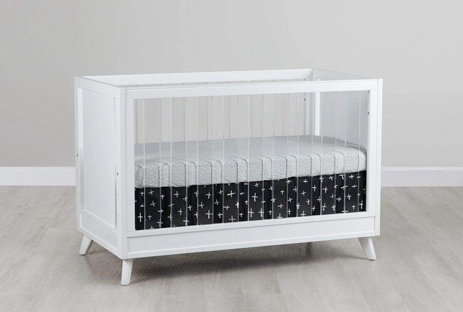 white acrylic crib