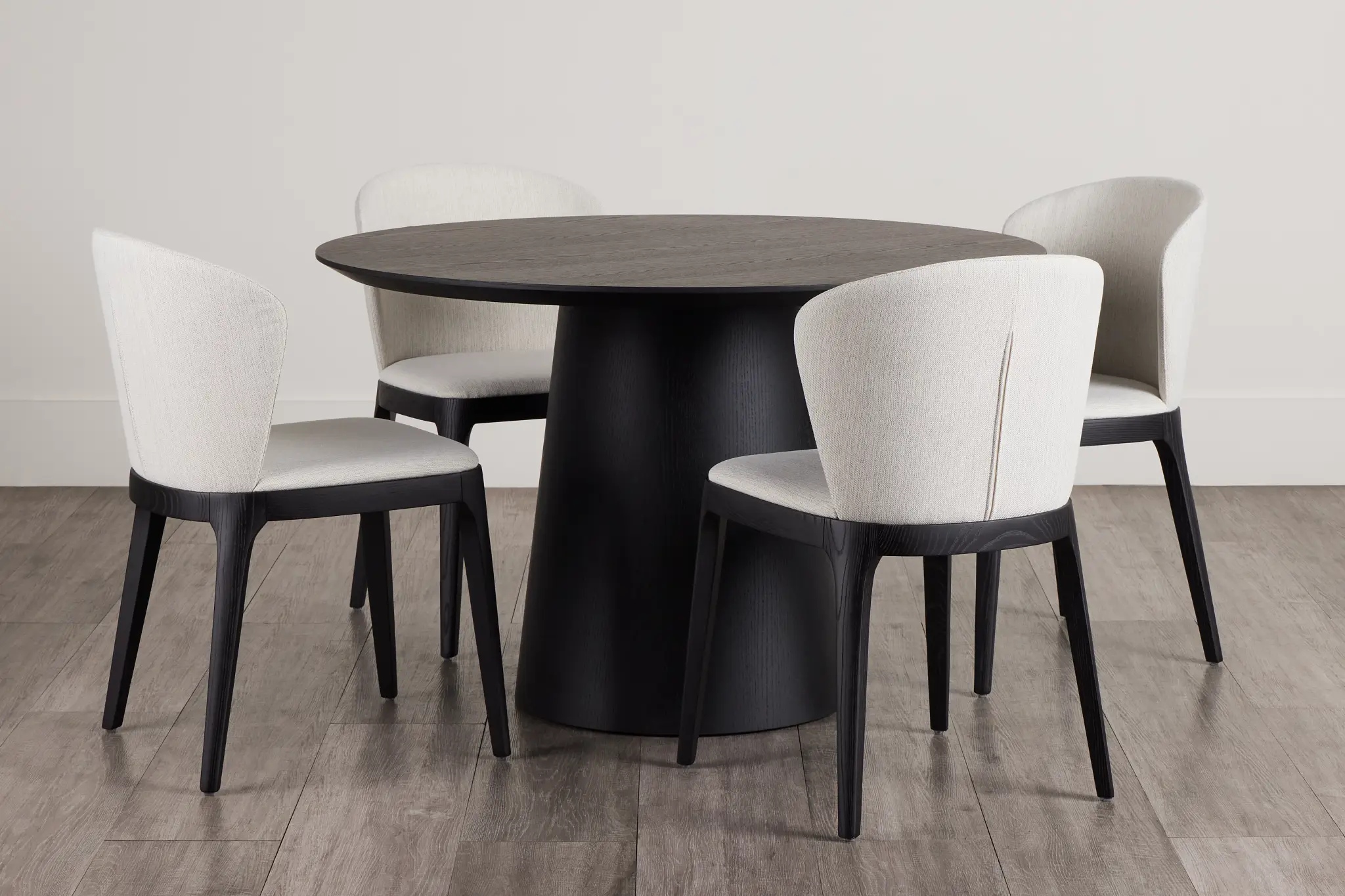 Nomad Black 47" Round Table & 4 Light Beige Chairs W/ Black Legs Nomad Black 47" Round Table & 4 Light Beige Chairs W/ Black Legs