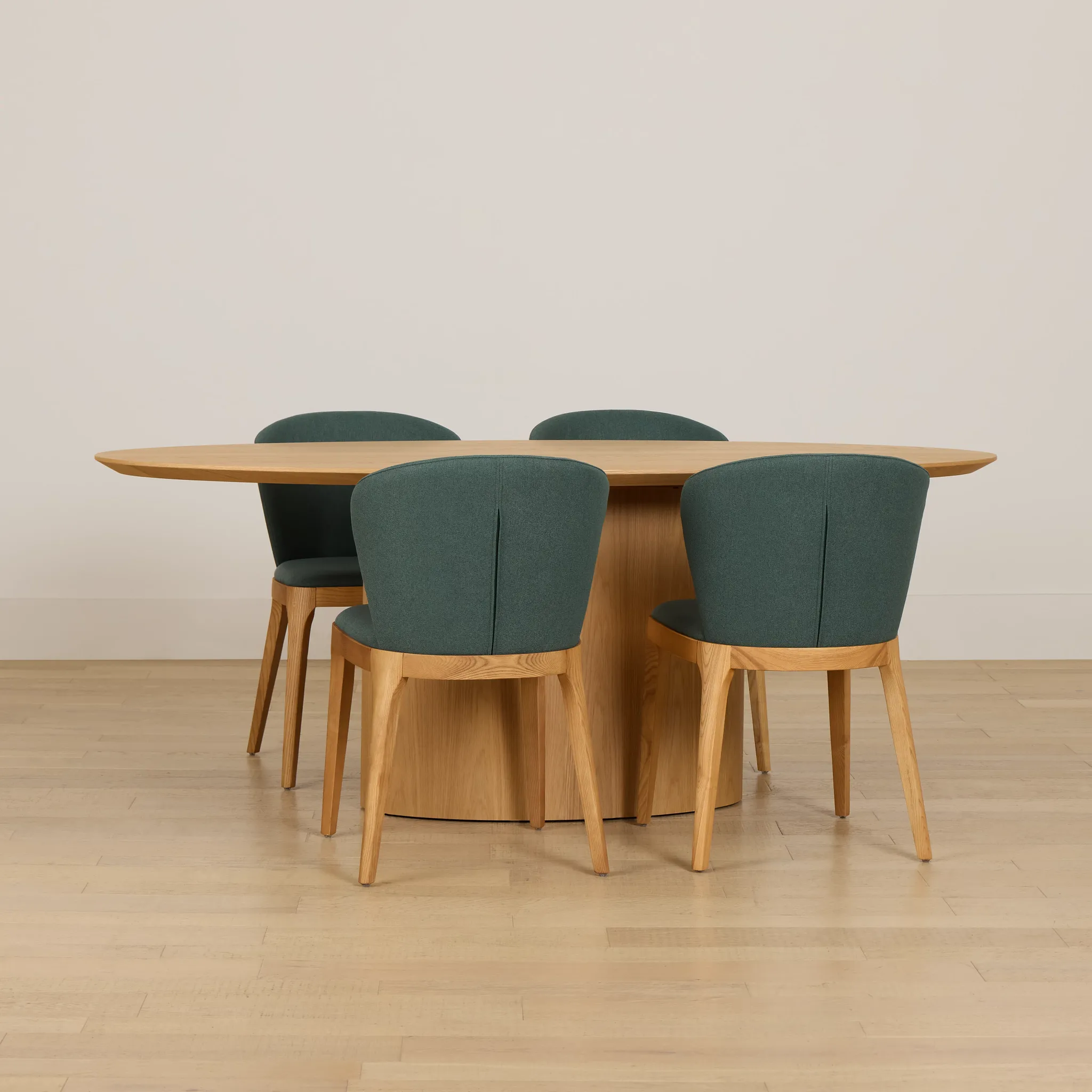 Nomad Light Tone 78" Oval Table & 4 Dark Green Chairs W/ Light Tone Leg