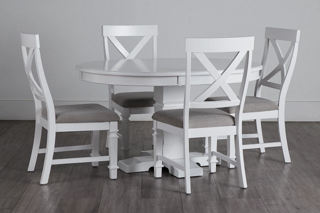 white wooden chairs