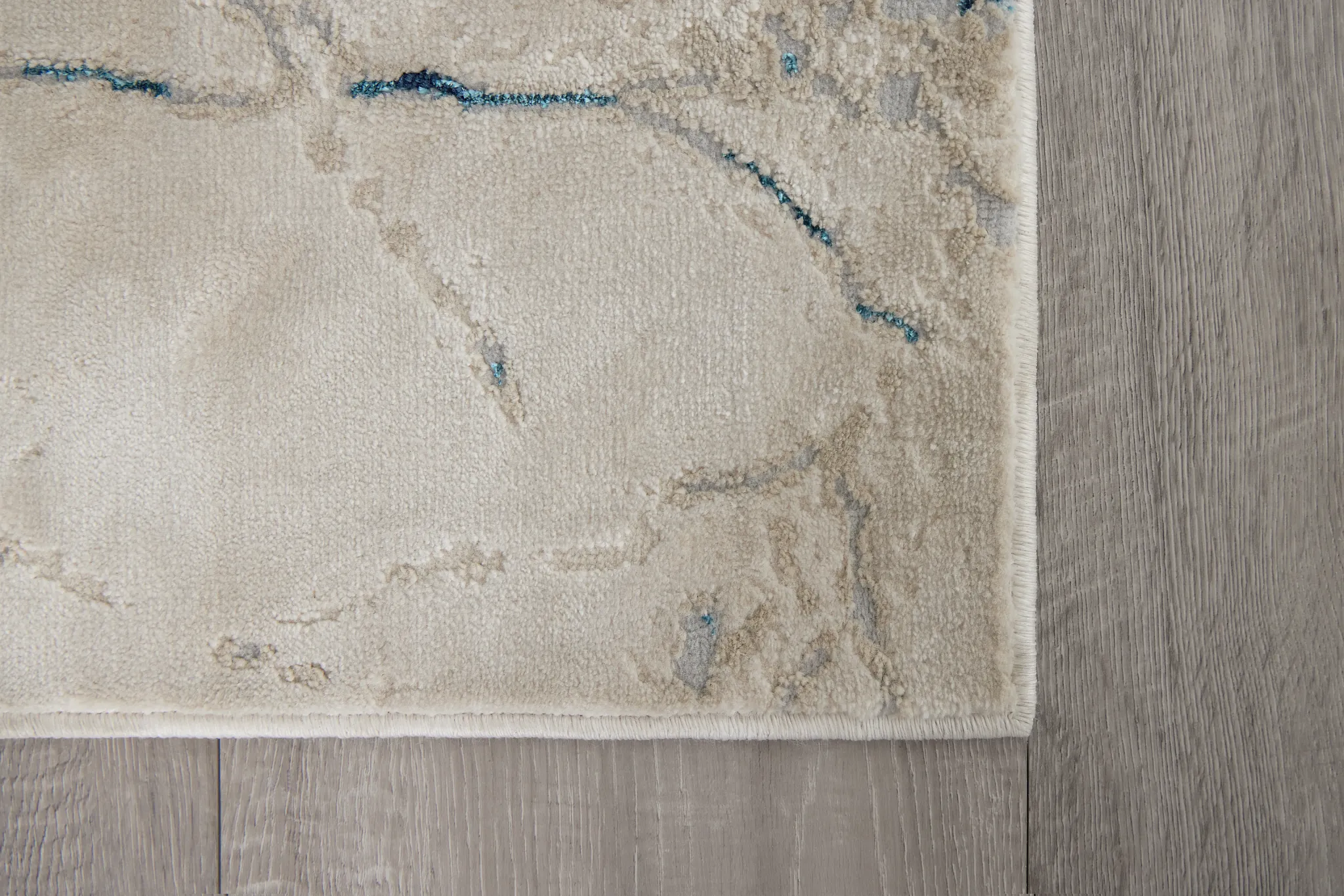 Castrin Ivory 8x10 Area Rug