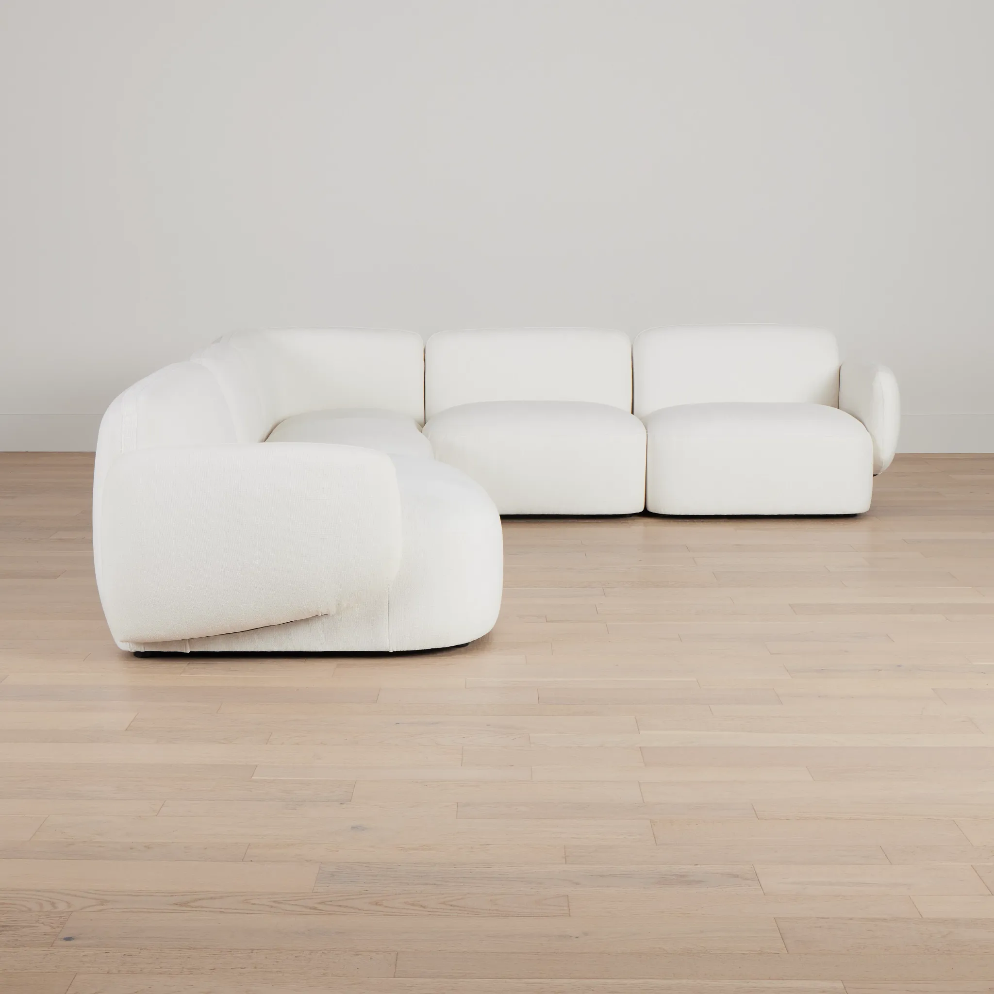 Halsey White Fabric Medium Left Facing Cuddler Sectional