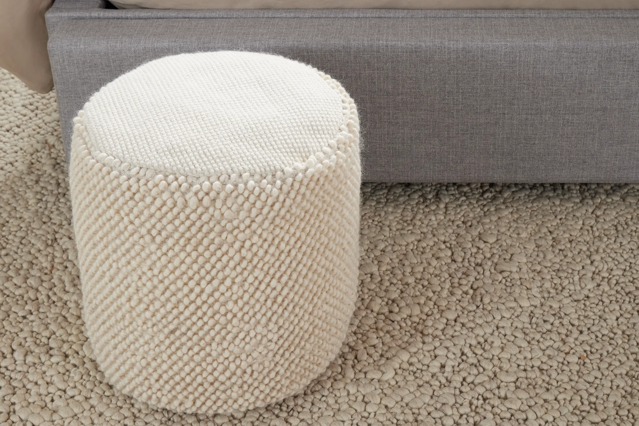 Jordan Ivory Round Accent Pouf