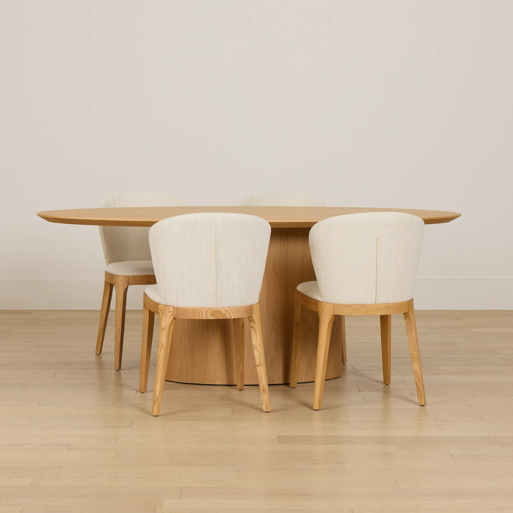 Nomad Light Tone 78" Oval Table & 4 Light Beige Chairs W/light Tone Leg