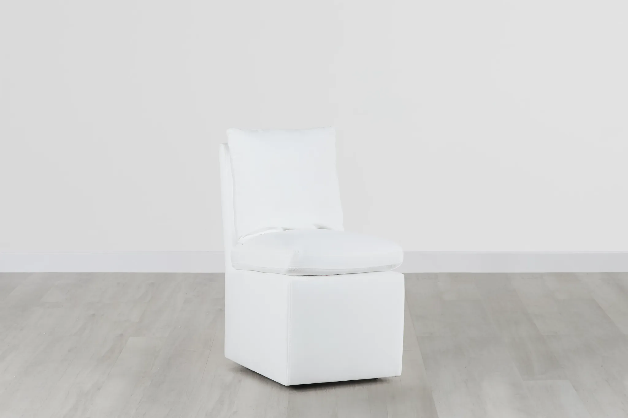 Auden White Castored Upholstered Side Chair