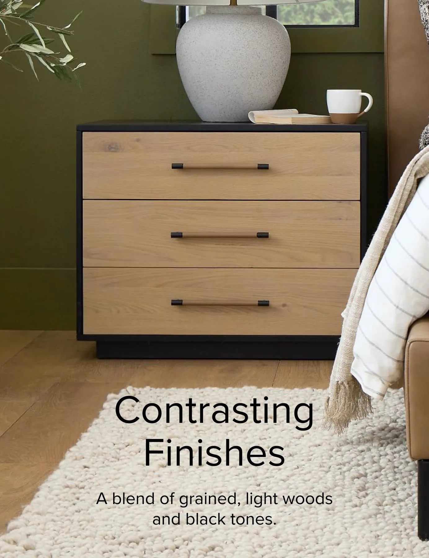 Contrasting Finishes. A Blend Of Grained Light Woods And Black Tones.