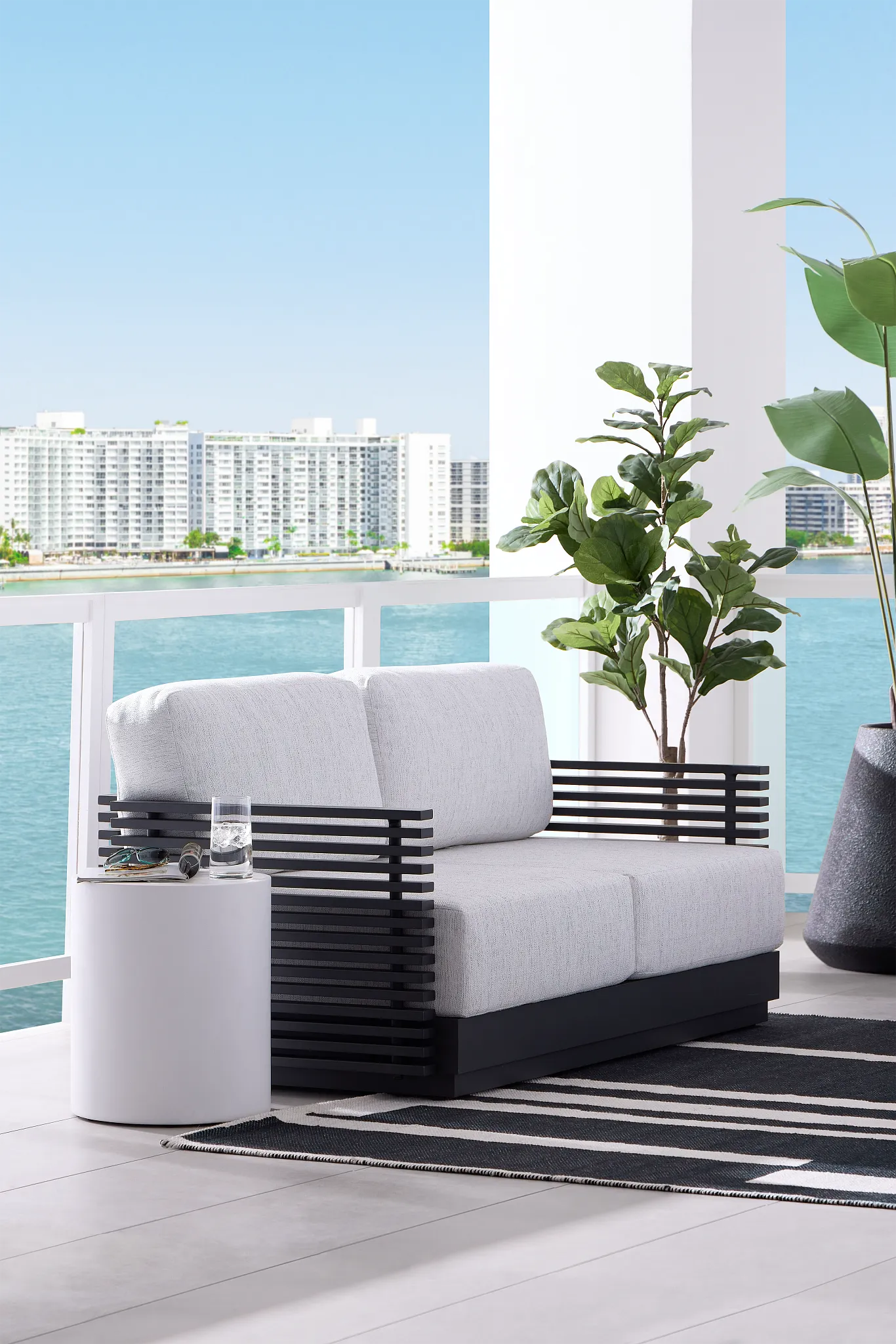 Monterey Black Aluminum Loveseat With Light Gray Cushions