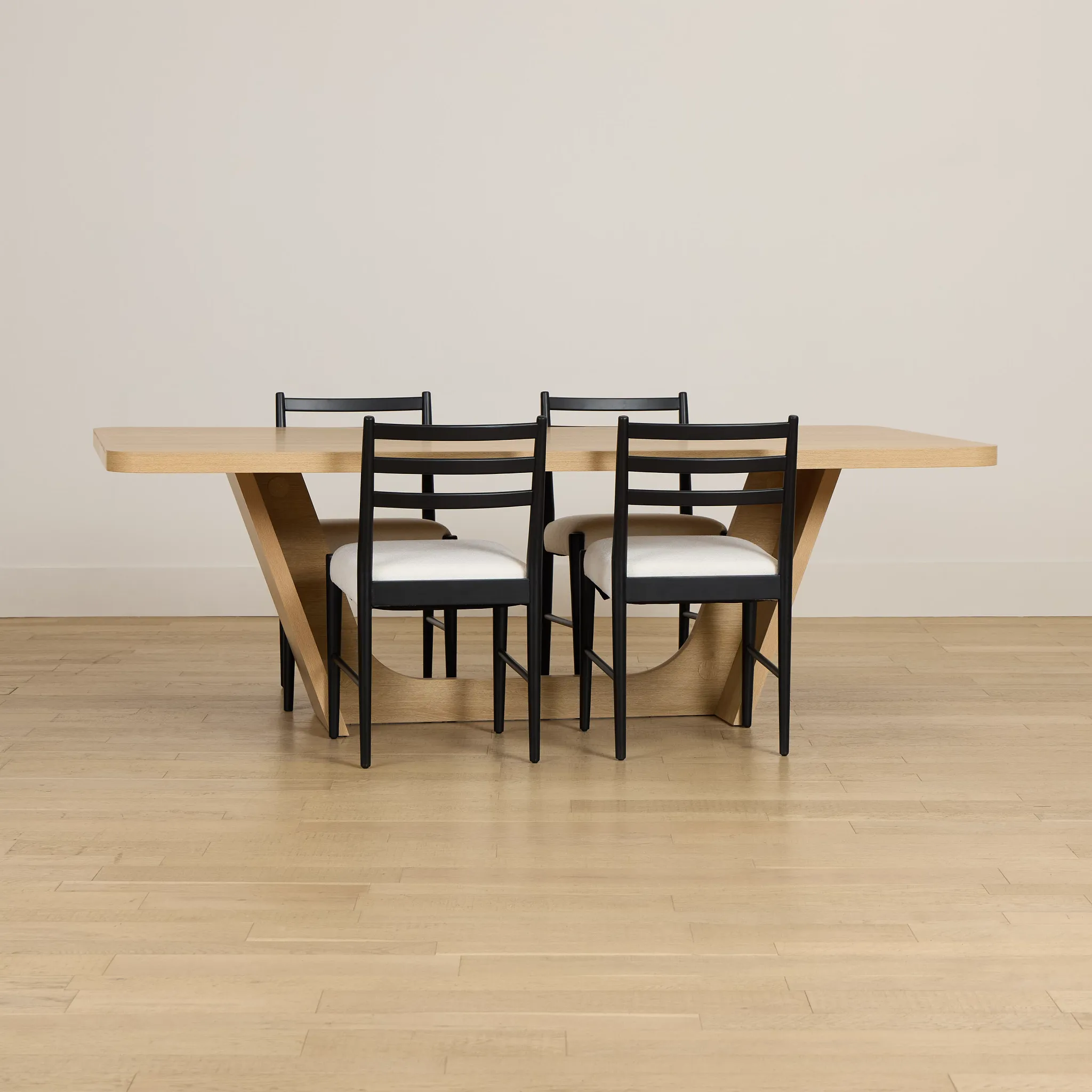 Lyndie Light Tone Rect Table With 4 Black Upholstered Side Chairs