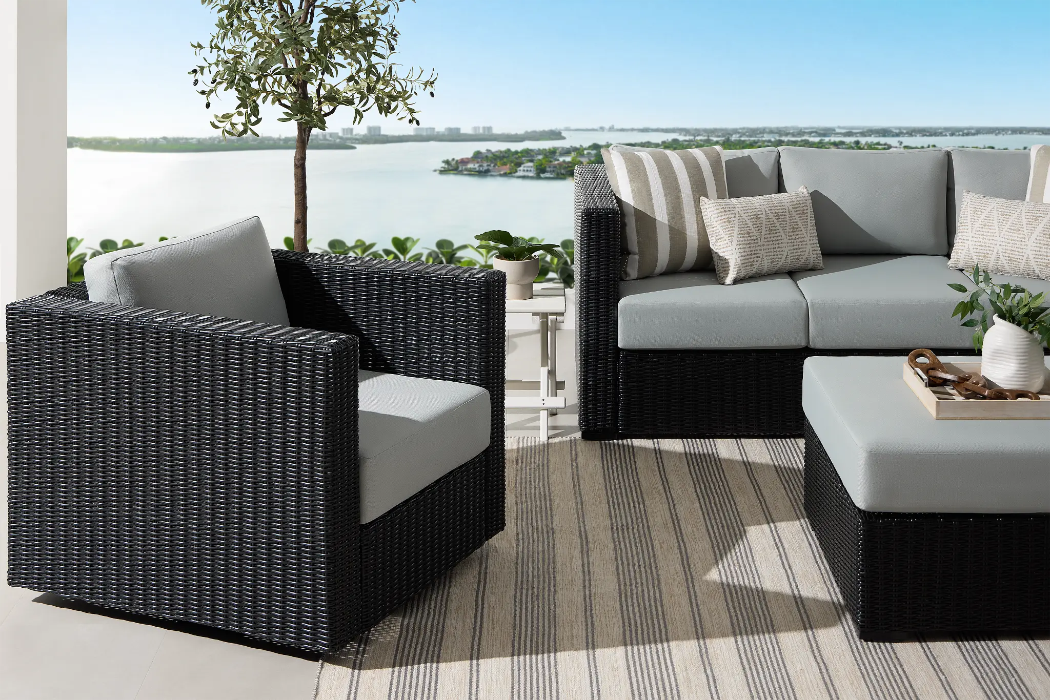 Montecito Black Swivel Chair With Light Blue Cushions Montecito Black Swivel Chair With Light Blue Cushions