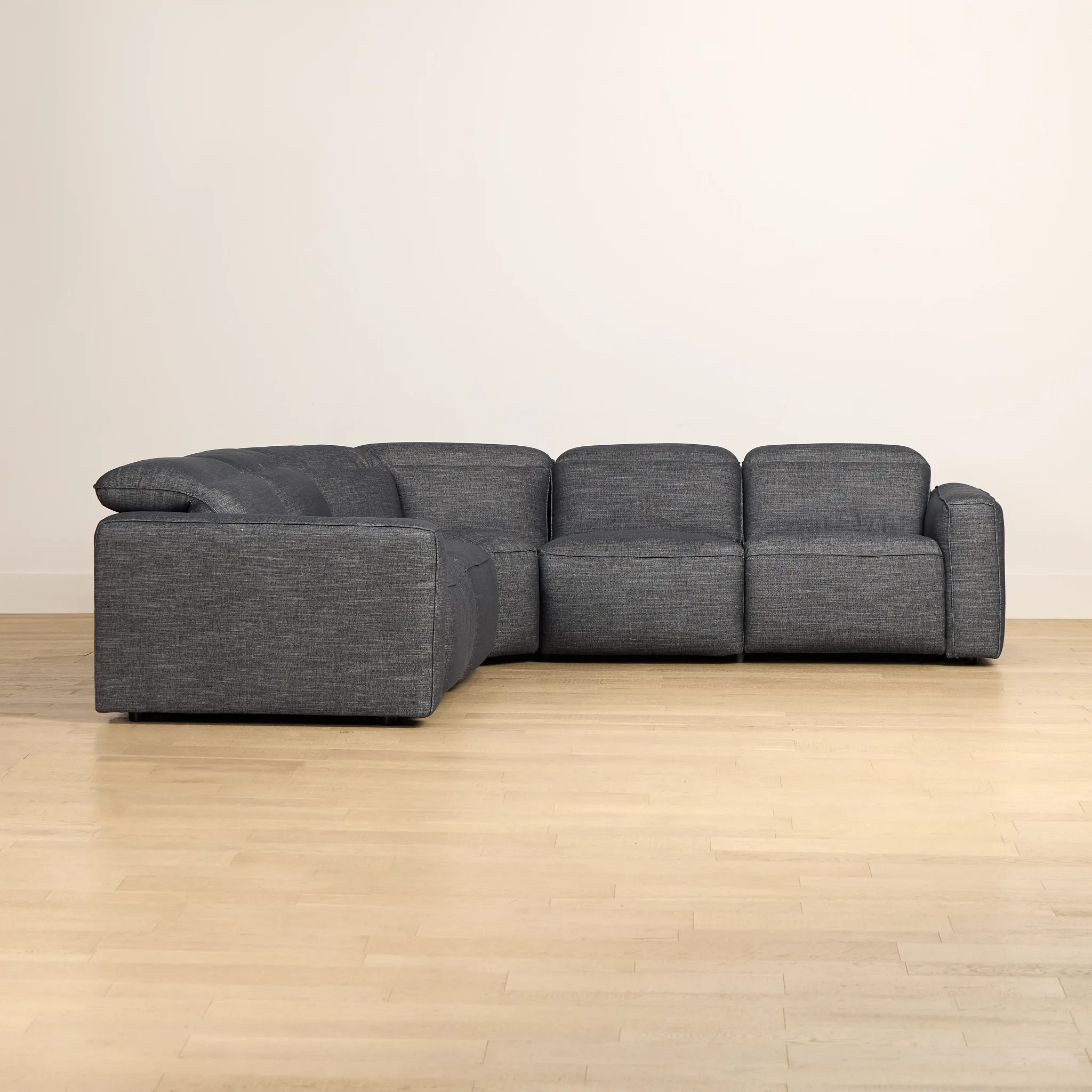 Ryland Dark Gray Fabric Small Two-arm Power Reclining Sectional