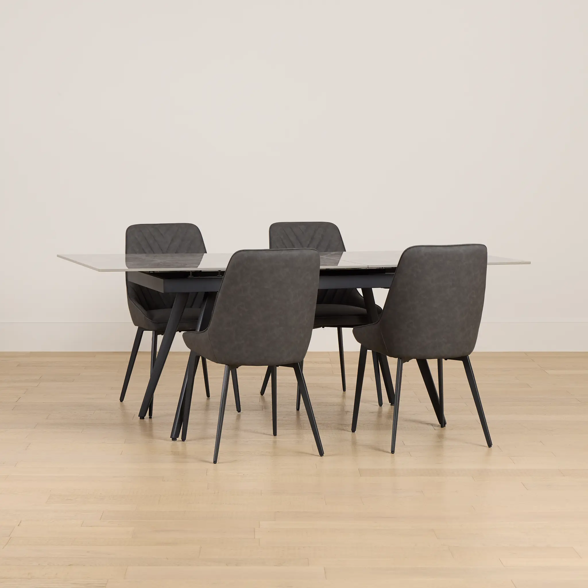 Maricopa Gray Extension Table & 4 Dark Gray Upholstered Chairs Maricopa Gray Extension Table & 4 Dark Gray Upholstered Chairs
