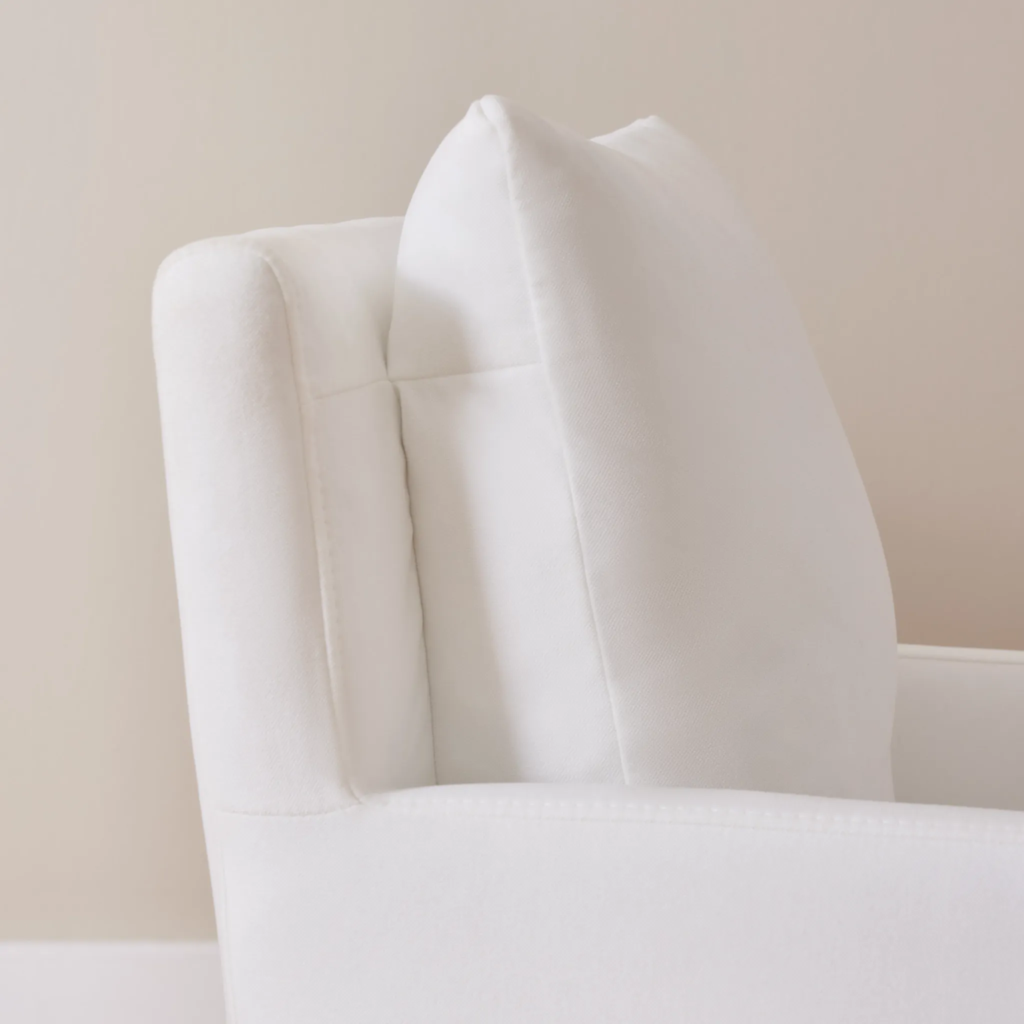 Auden White Castored Upholstered Arm Chair