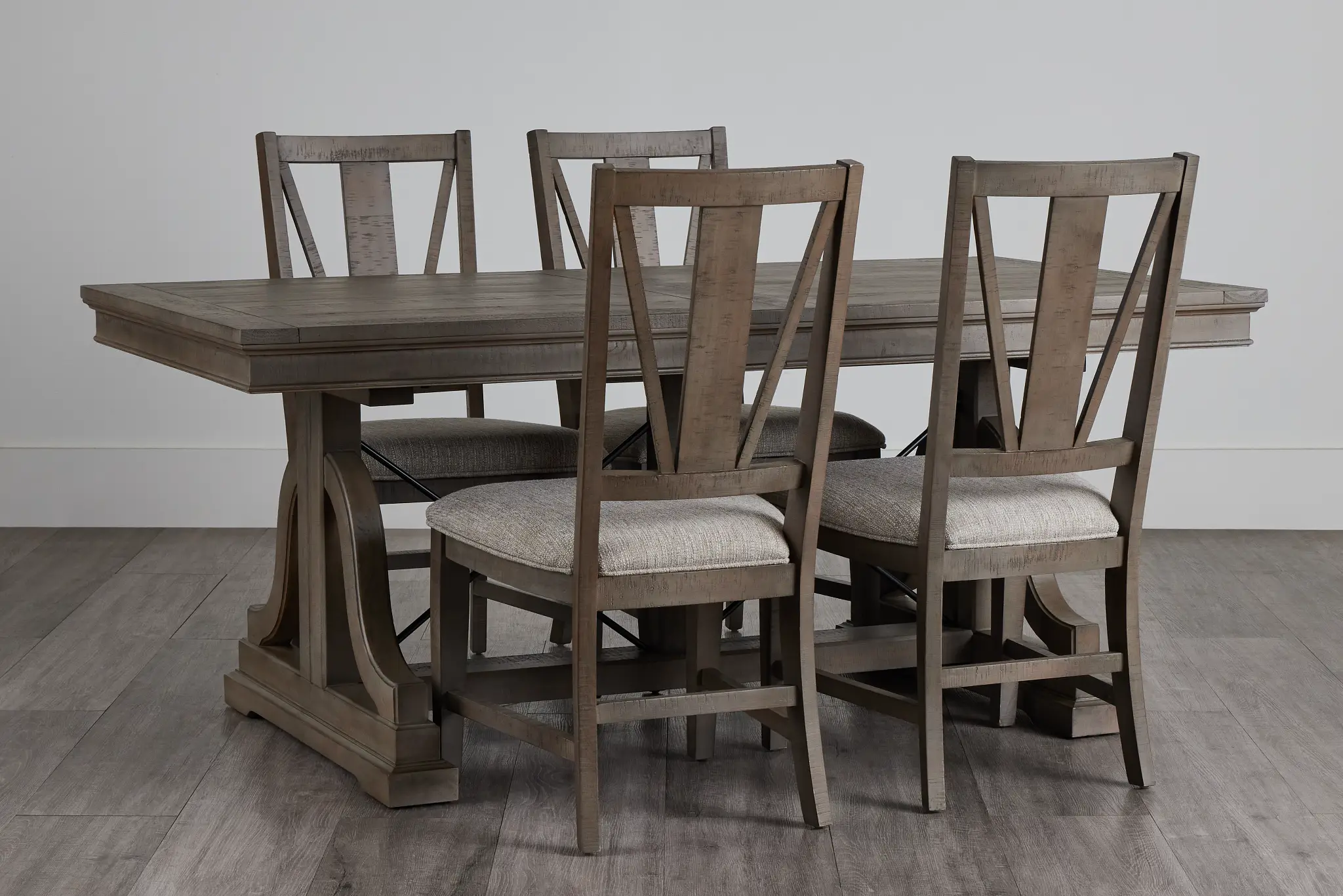 Heron Cove Light Tone Trestle Rectangular Table & 4 Wood Chairs Heron Cove Light Tone Trestle Rectangular Table & 4 Wood Chairs