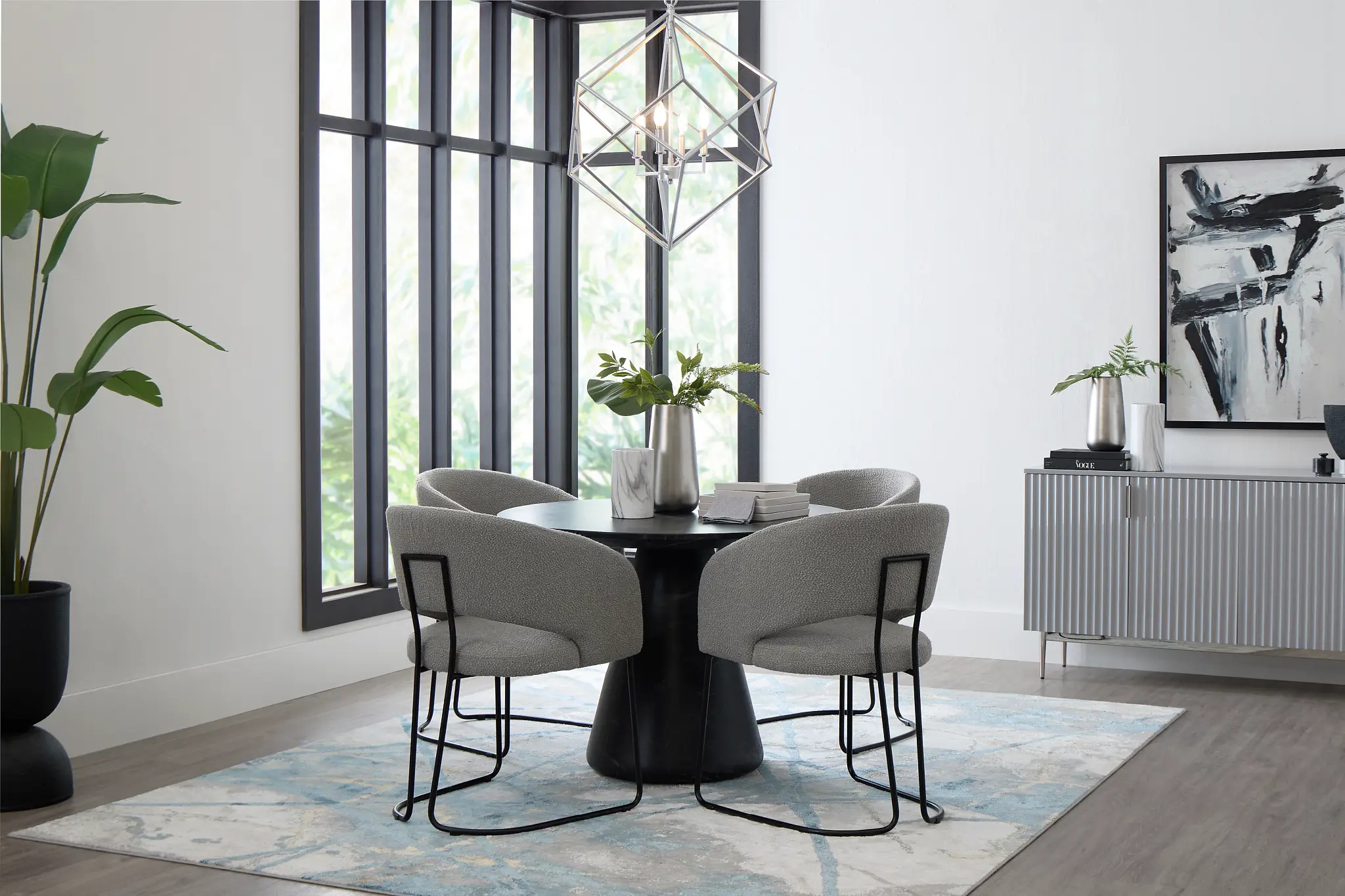 Merrick Black Round Table With 4 Gray Upholstered Side Chairs Merrick Black Round Table With 4 Gray Upholstered Side Chairs