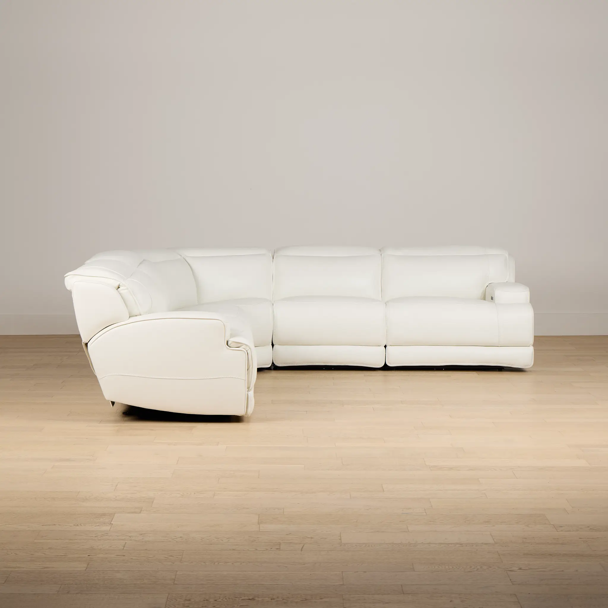 Reign White Lthr/vinyl Small Two-arm Power Reclining Sectional Reign White Lthr/vinyl Small Two-arm Power Reclining Sectional