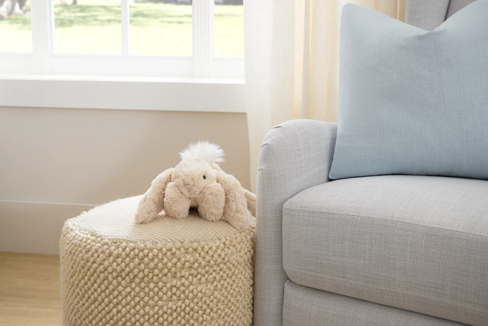 Jordan Ivory Round Accent Pouf