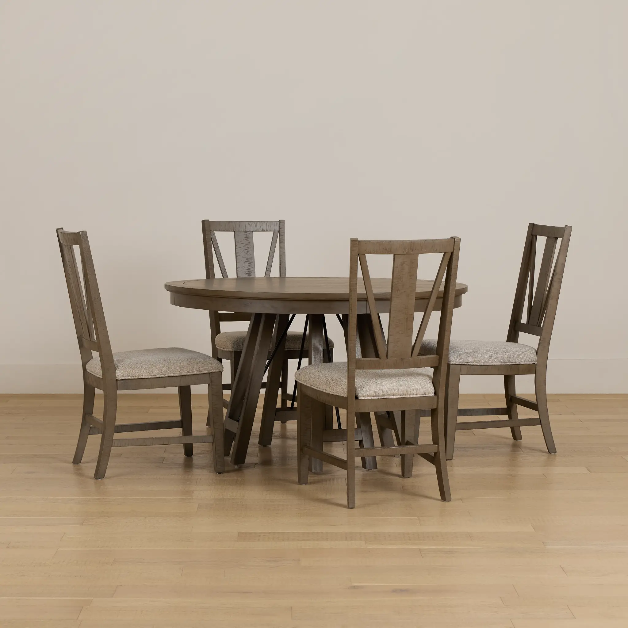 Heron Cove Light Tone Round Table & 4 Wood Chairs Heron Cove Light Tone Round Table & 4 Wood Chairs