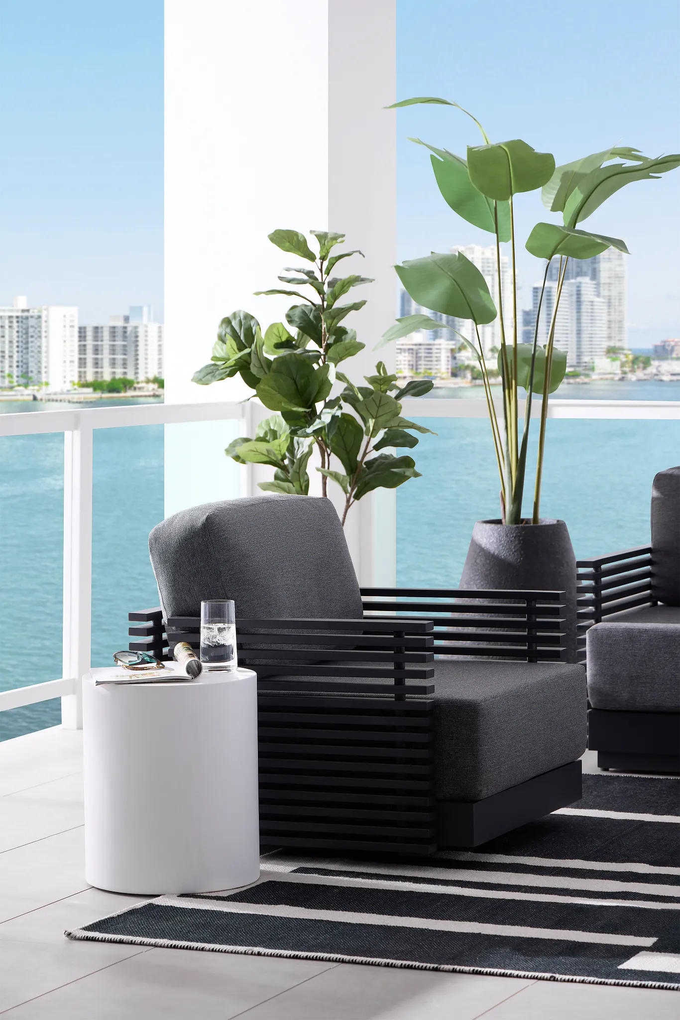 Monterey Black Aluminum Swivel Chair With Gray Cushions