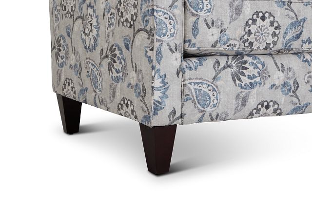 blue floral chair and ottoman