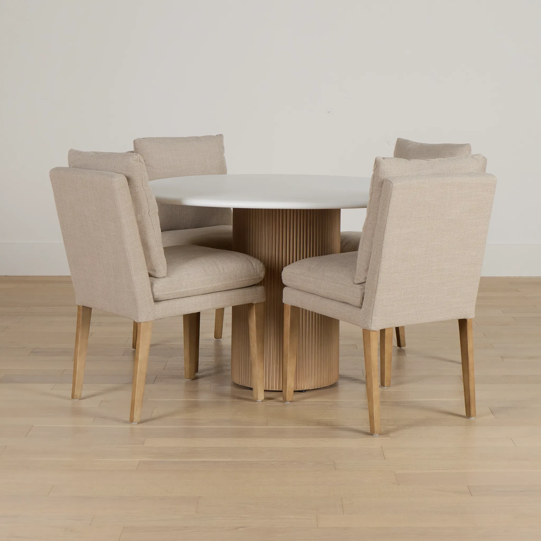 Bryant White Round Table & 4 Upholstered Chairs