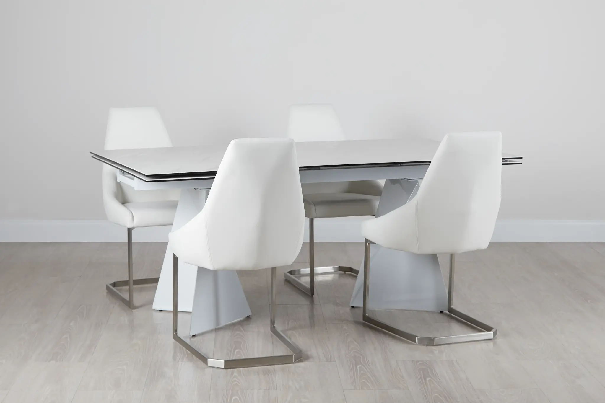 Monaco White Ceramic Table & 4 Upholstered Chairs Monaco White Ceramic Table & 4 Upholstered Chairs
