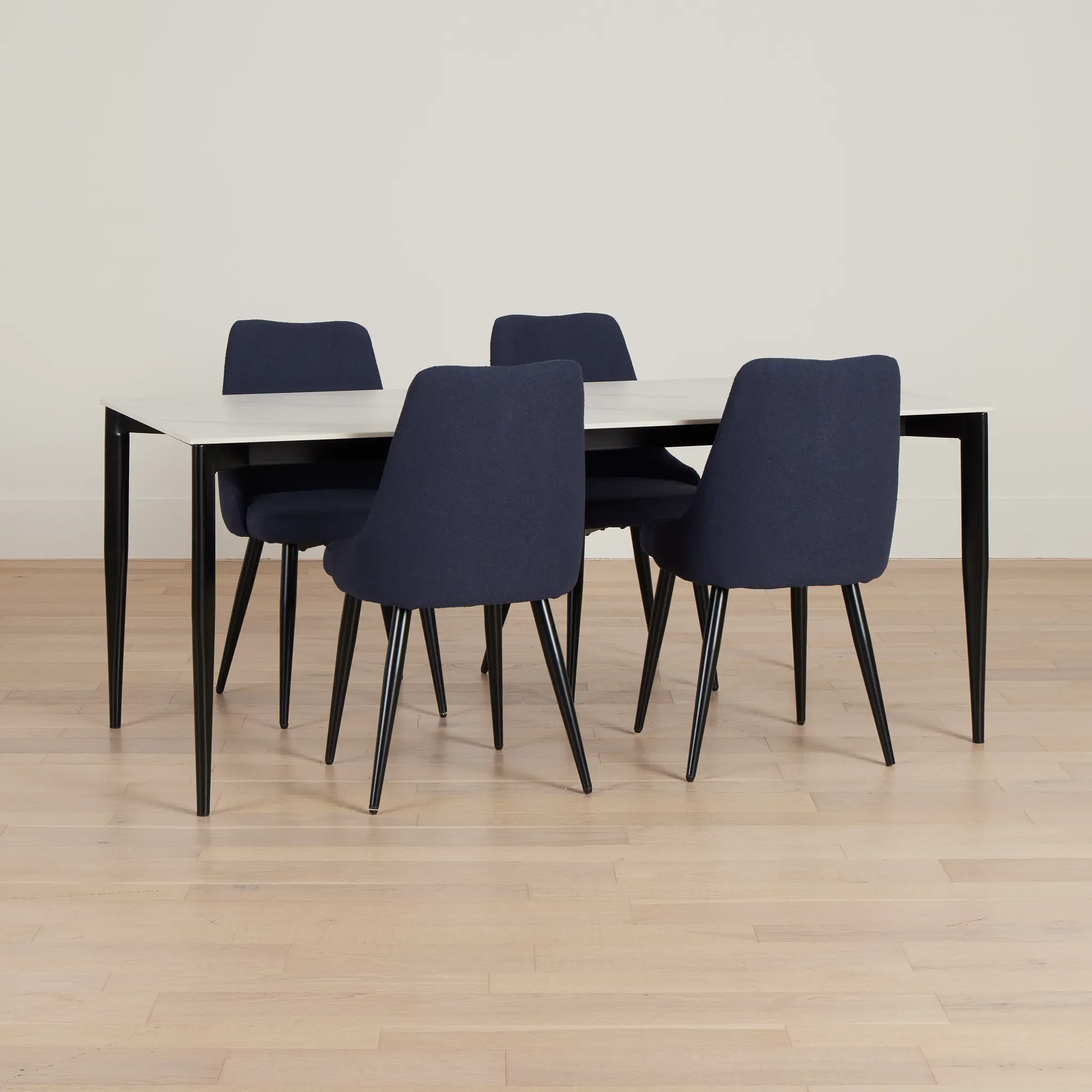 Andover White Rect Table & 4 Dark Blue Upholstered Curved Chairs Andover White Rect Table & 4 Dark Blue Upholstered Curved Chairs