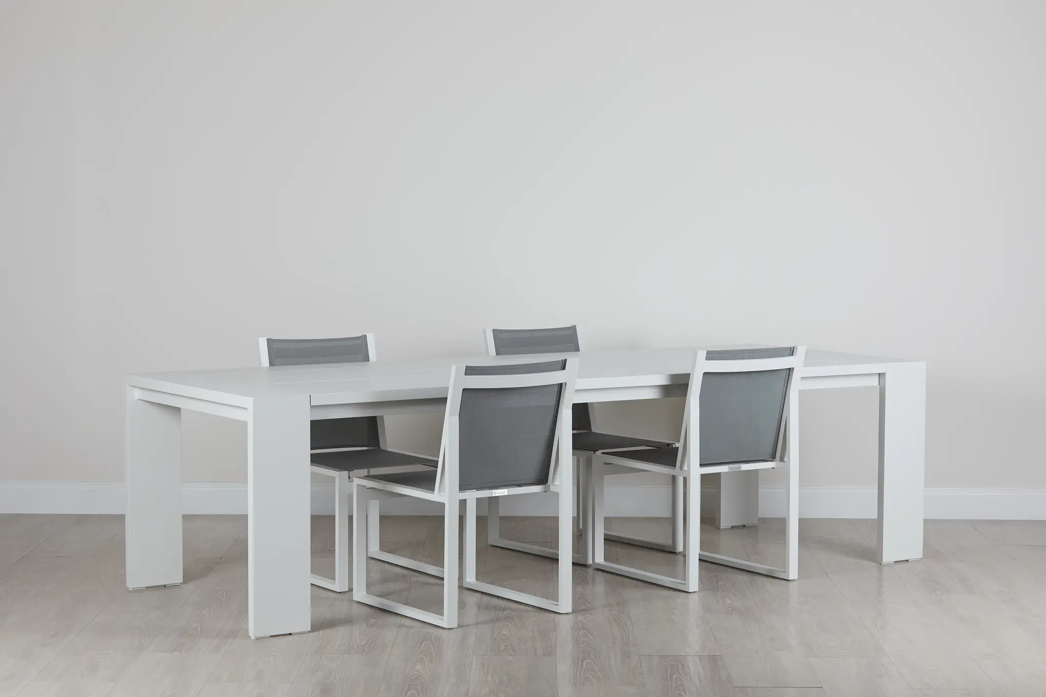 Linear White 110" Aluminum Table & 4 Sling Side Chairs Linear White 110" Aluminum Table & 4 Sling Side Chairs