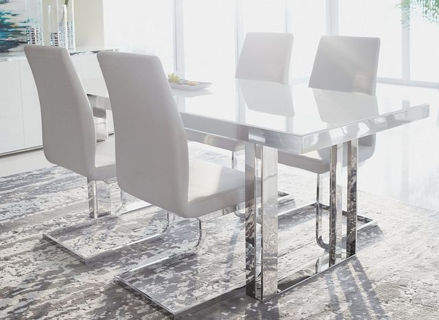 glass dining table and white chairs