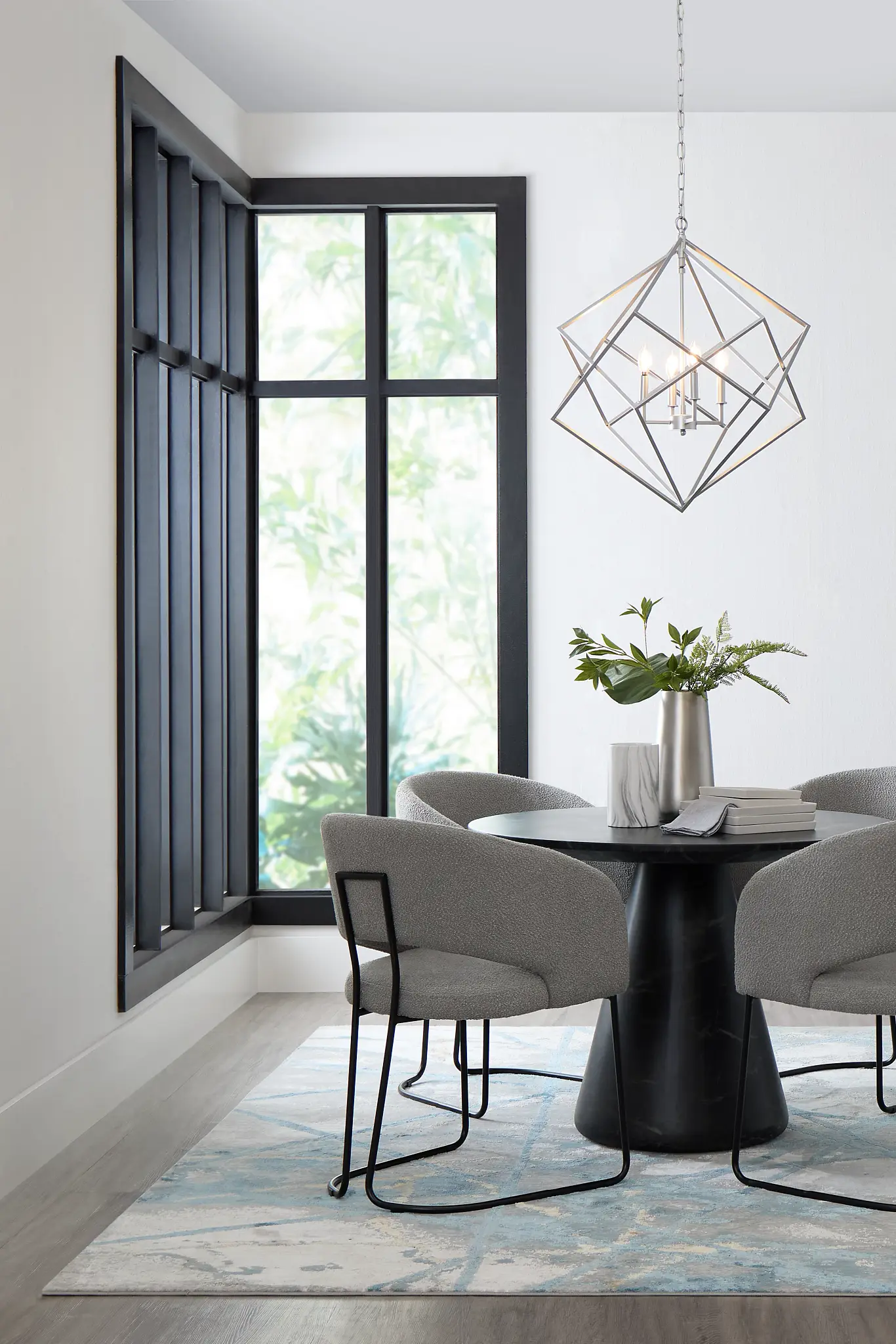 Merrick Black Round Table With 4 Gray Upholstered Side Chairs Merrick Black Round Table With 4 Gray Upholstered Side Chairs