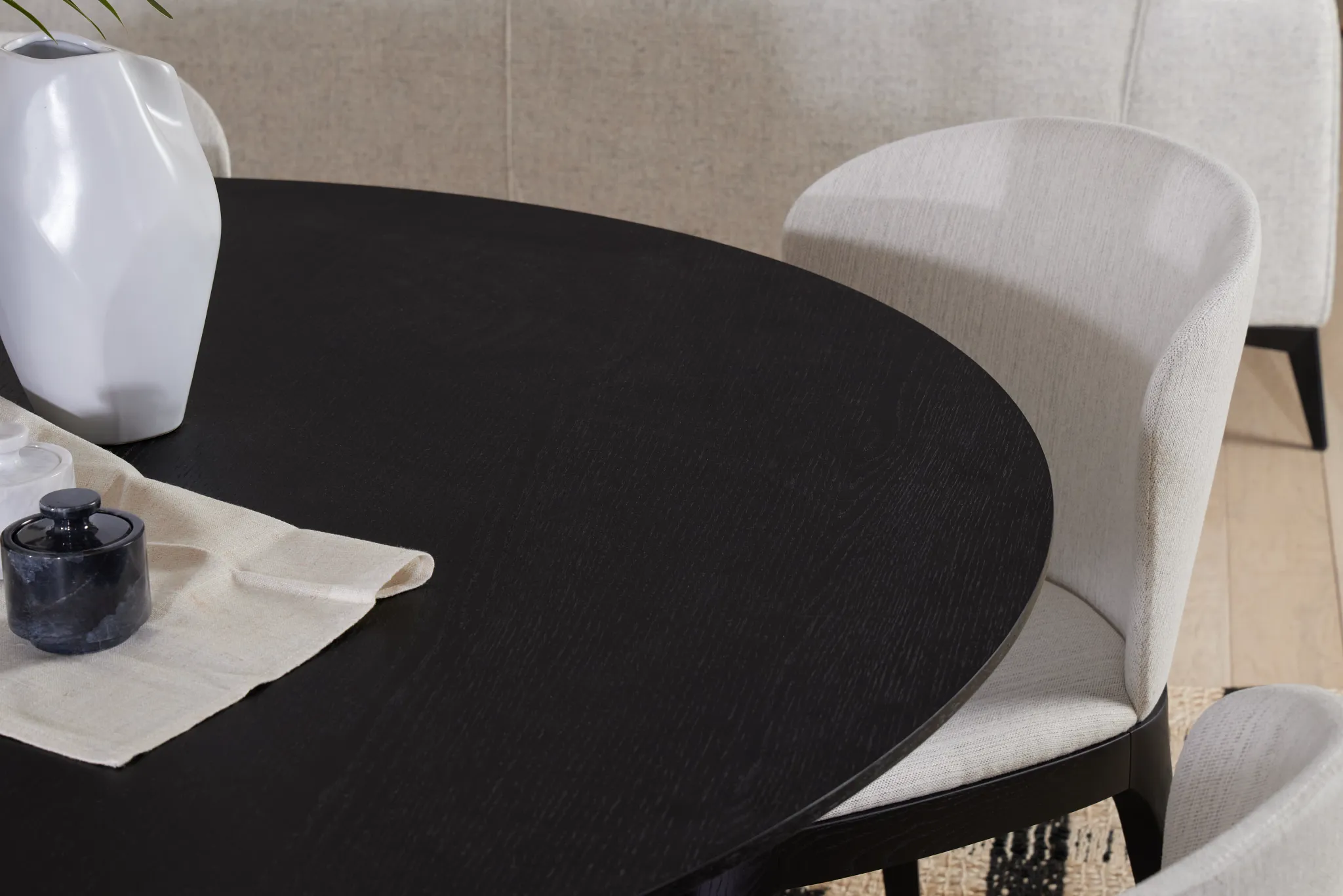 Nomad Black 59" Round Table & 4 Light Beige Chairs W/ Black Legs