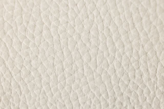 Walker Ivory Lthr/vinyl Small Two-arm Manually Reclining Sectional