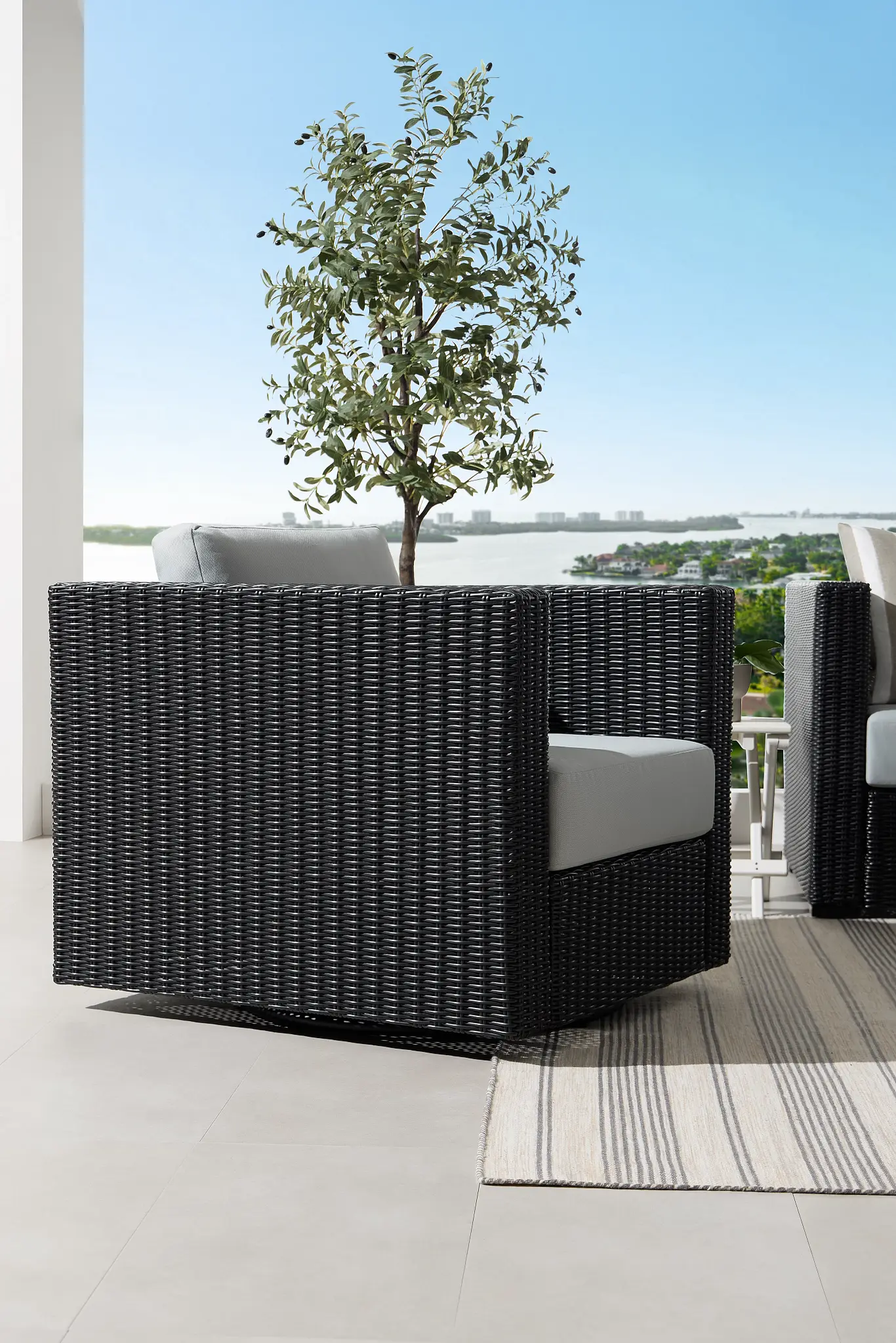 Montecito Black Swivel Chair With Light Blue Cushions Montecito Black Swivel Chair With Light Blue Cushions