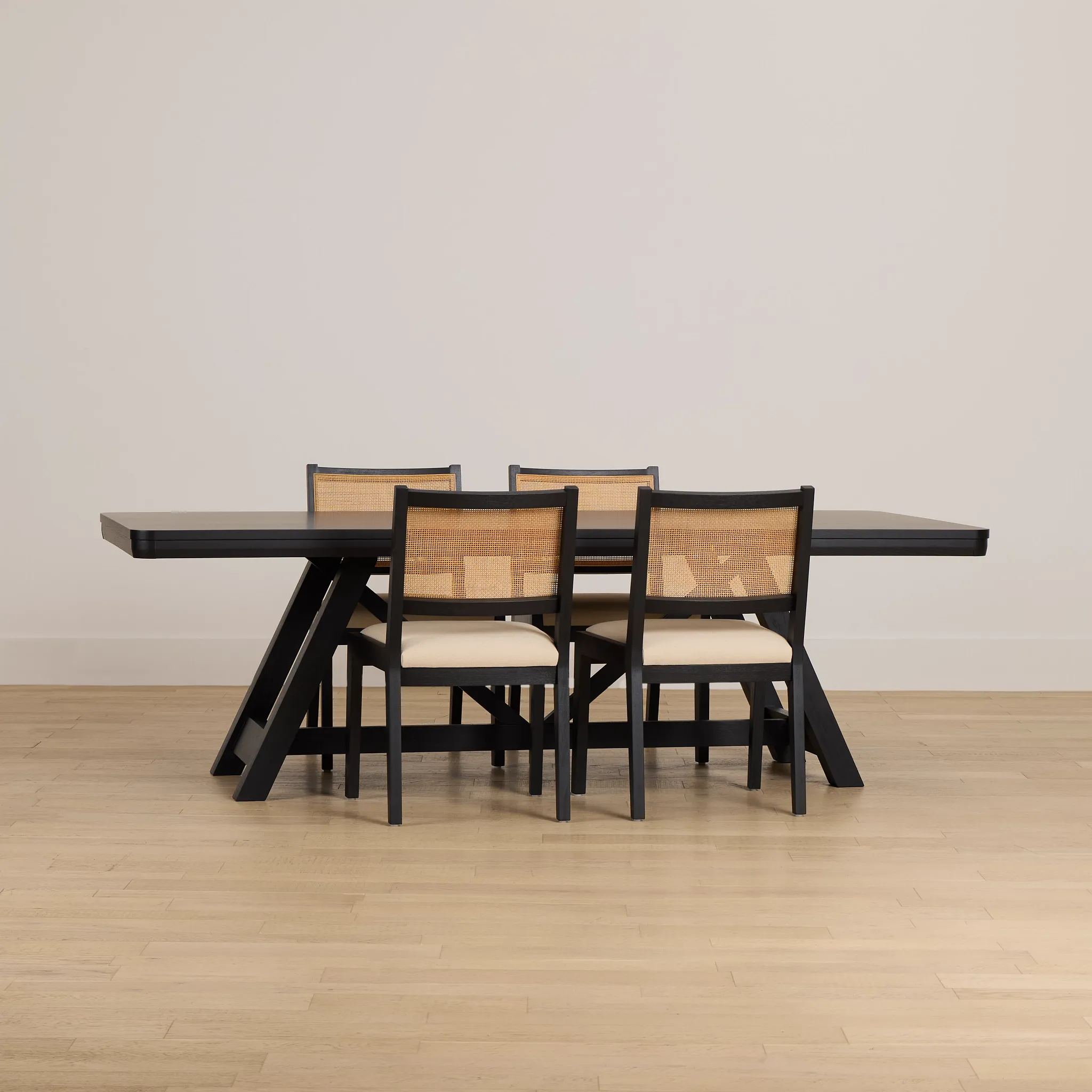Pacific Black Trestle Table & 4 Upholstered Chairs