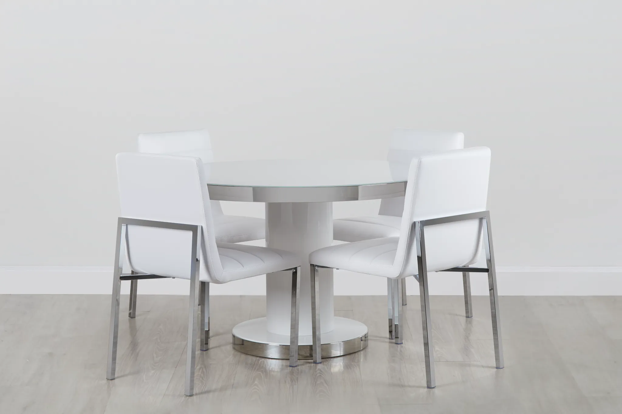 Miami White 47" Round Table & 4 Upholstered Chairs